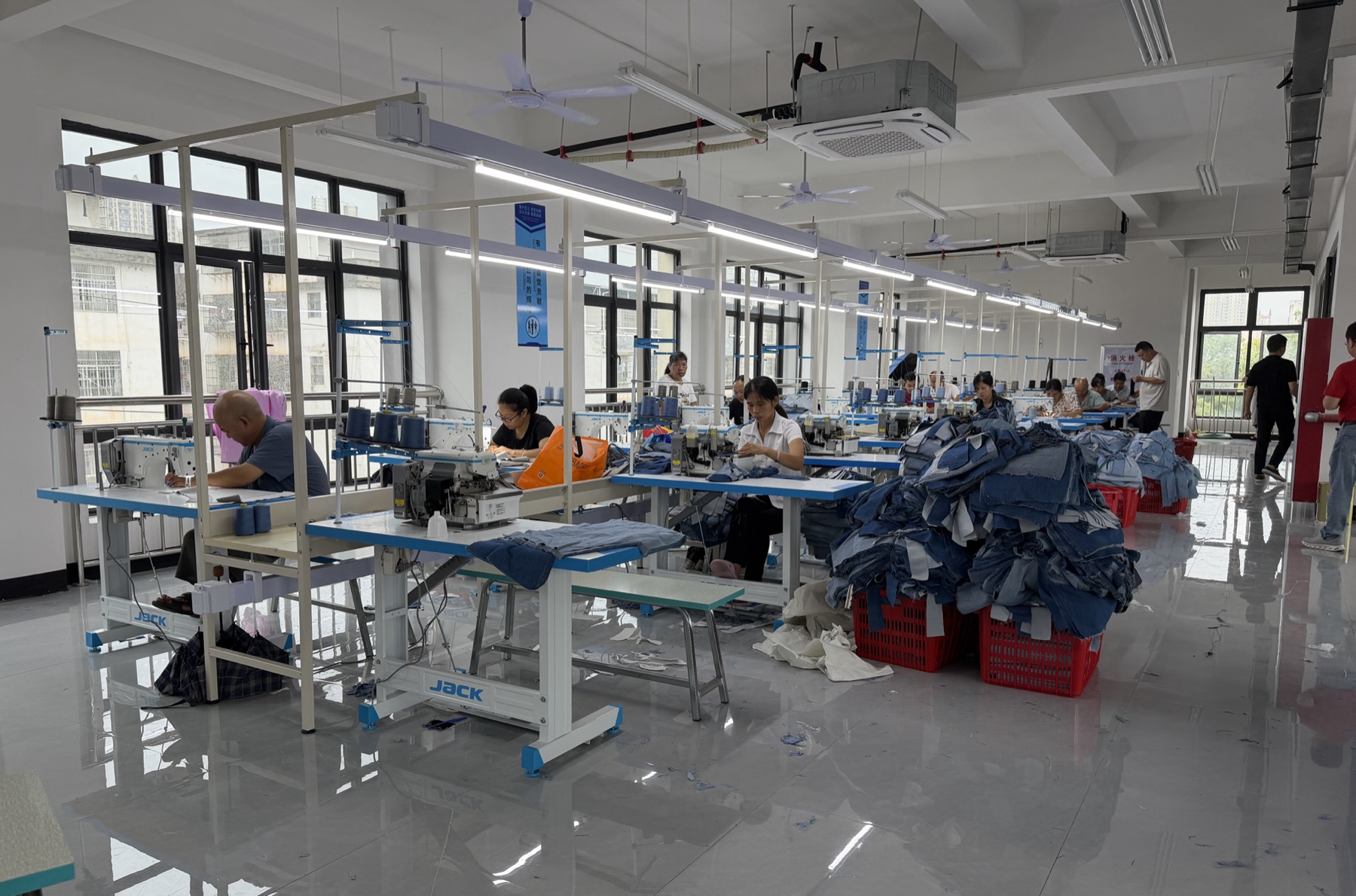 Real BSTARFA sewing workshop with garment workers and industrial sewing machines in Yudu Jiangxi